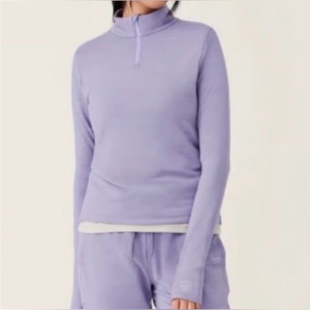 70. Allbirds Natural Run Mid Layer 1/4 Zip Lavender Purple, Size Medium.